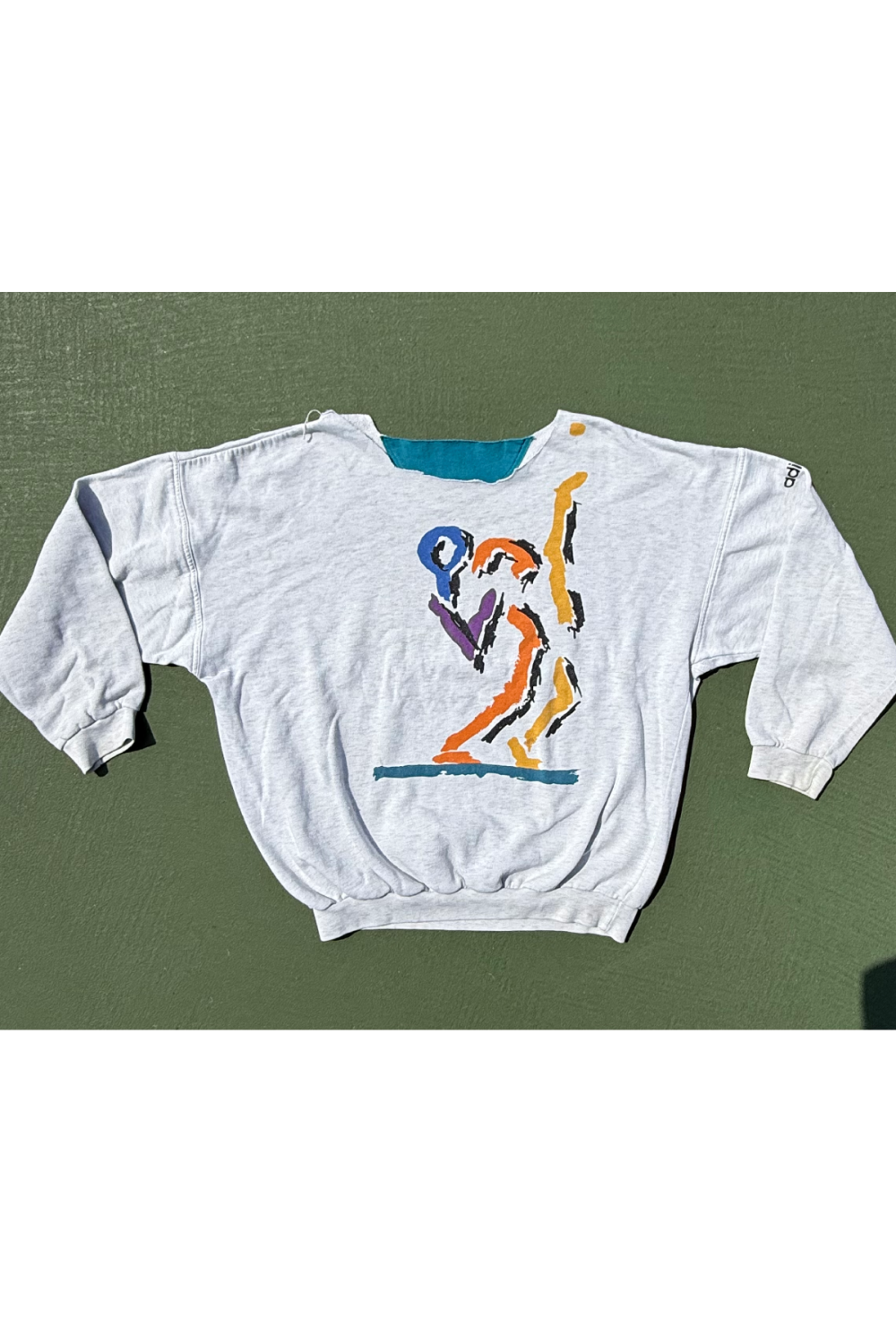 classic vintage womens tennis crewneck sweatshirt in heather gray showcasing 80's style artwork of colorful tennis player about to hit a serve
