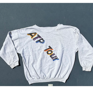 classic vintage womens tennis crewneck sweatshirt in heather gray showcasing 80's style font artwork of colorful text that says ATP Tour by Ace the Moon Tennis Brand