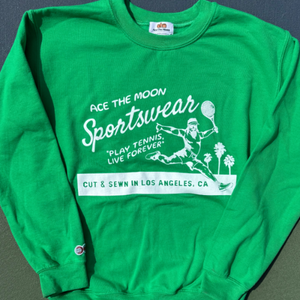 ace the moon tennis sportswear premium hand-knit sweater in green with the words "play tennis, live forever" and "cut & Sewn in los angeles, CA" 