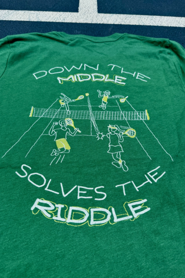 down the middle solves the riddle fun tennis tee by Ace the Moon tennis apparel brand LA