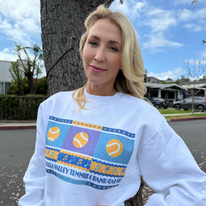 classic womens tennis crewneck sweatshirt worn by blonde female posing in front of a tree outside. sold by Ace the Moon premium tennis apparel brand