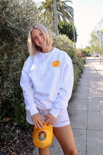 That's a good ball crewneck sweatshirt by Ace the Moon tennis and pickleball apparel brand