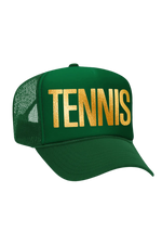 Green cap with 'TENNIS' in gold on a white background