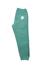 Teal sweatpants with a logo on the pocket against a white background