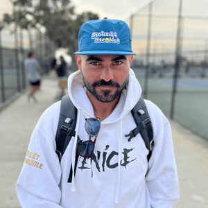 stoked 4 strokes tennis hat by Ace the moon tennis and pickleball apparel brand los angeles california. blue nylon hat